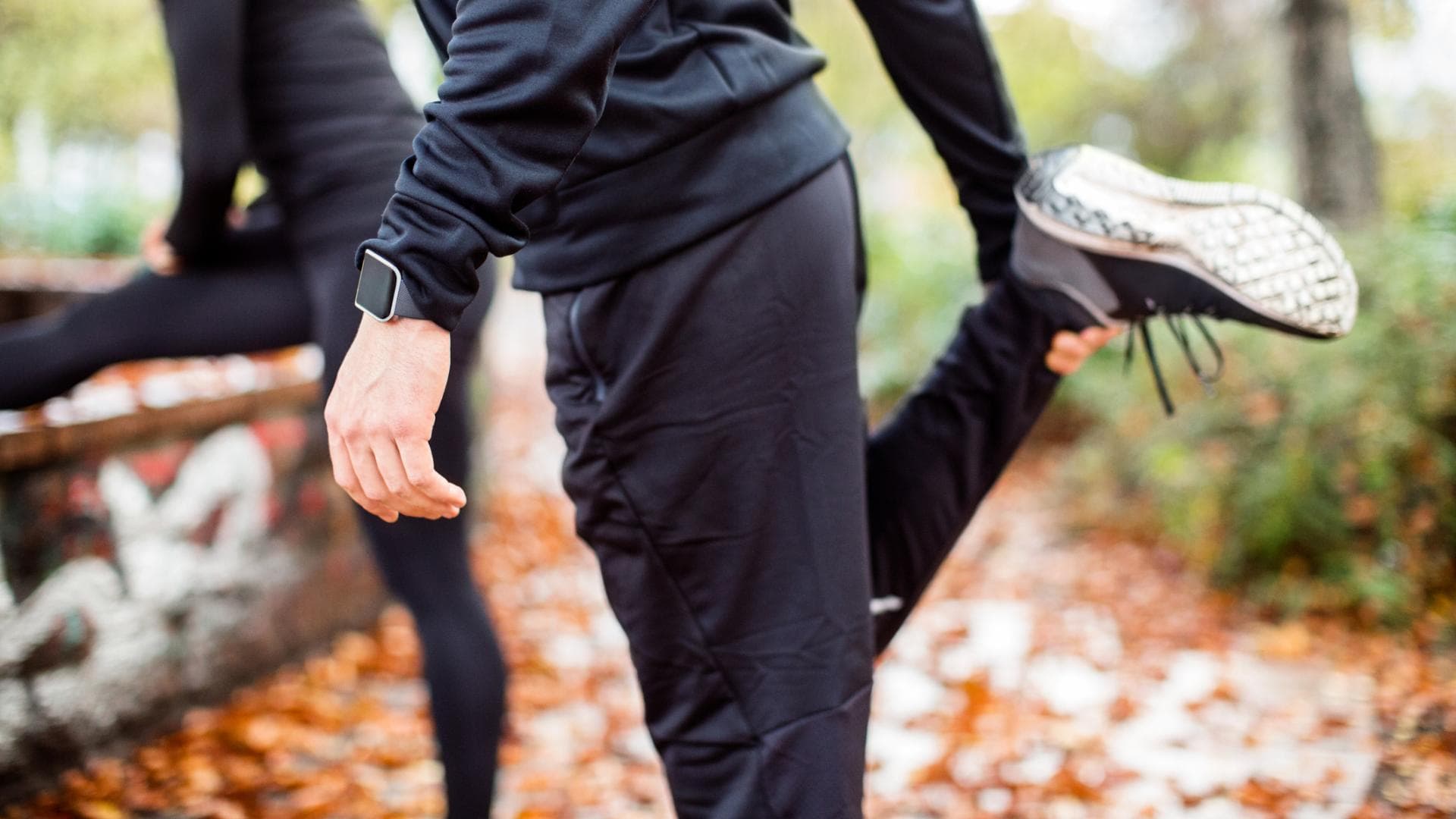 Jogger dehnen sich Jogger dehnen sich