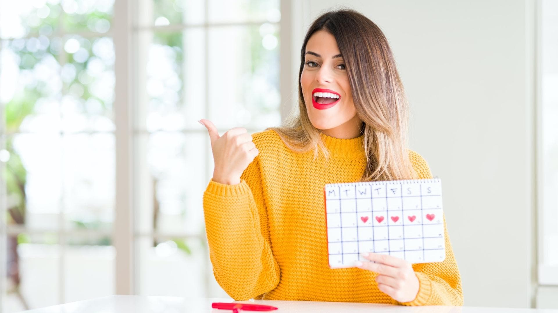 Frau mit Menstruationskalender Frau mit Menstruationskalender