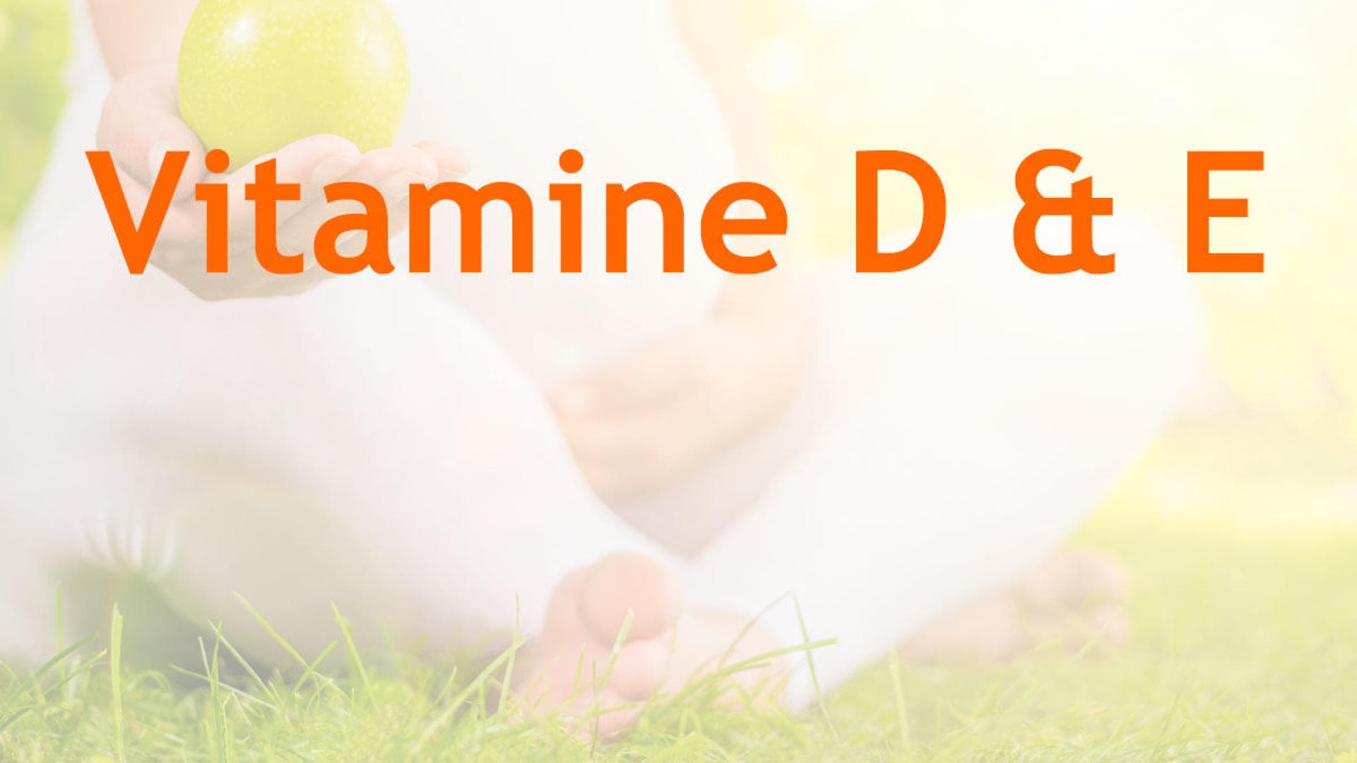 schwangere Frau mit Apfel Vitamine in der Schwangerschaft