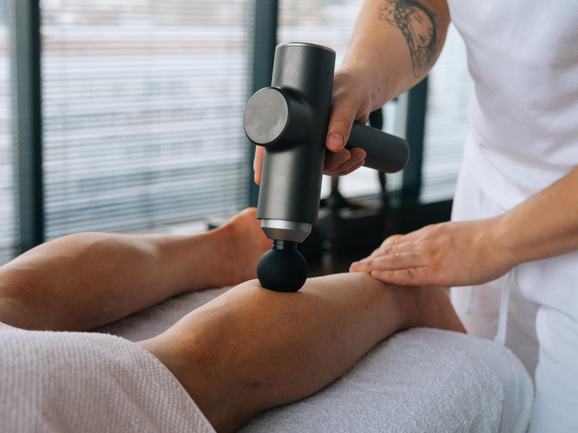 Massagepistole Behandlung