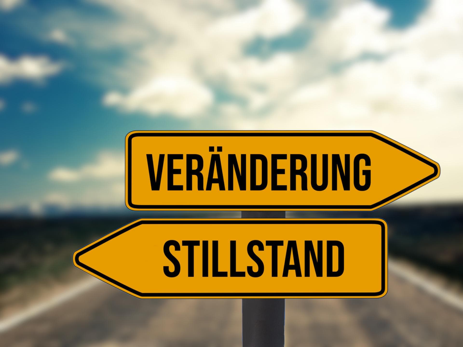 Schild mit den Worten Veränderung und Stillstand