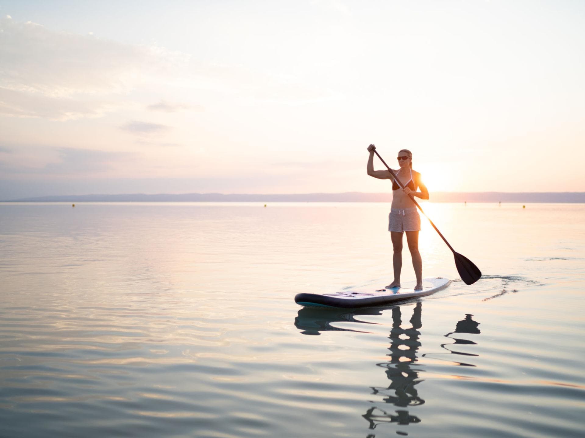 Frau_auf_SUP Frau auf SUP auf See