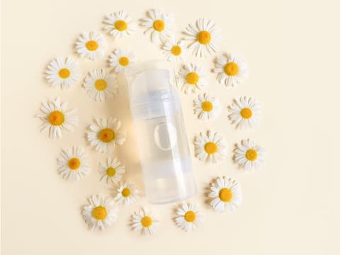 Falsche Gleitgel mit Blumen drum herum