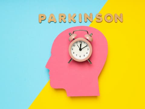 Abbildung Kopf und Parkinson